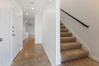 Carpeted stairs and 2nd level